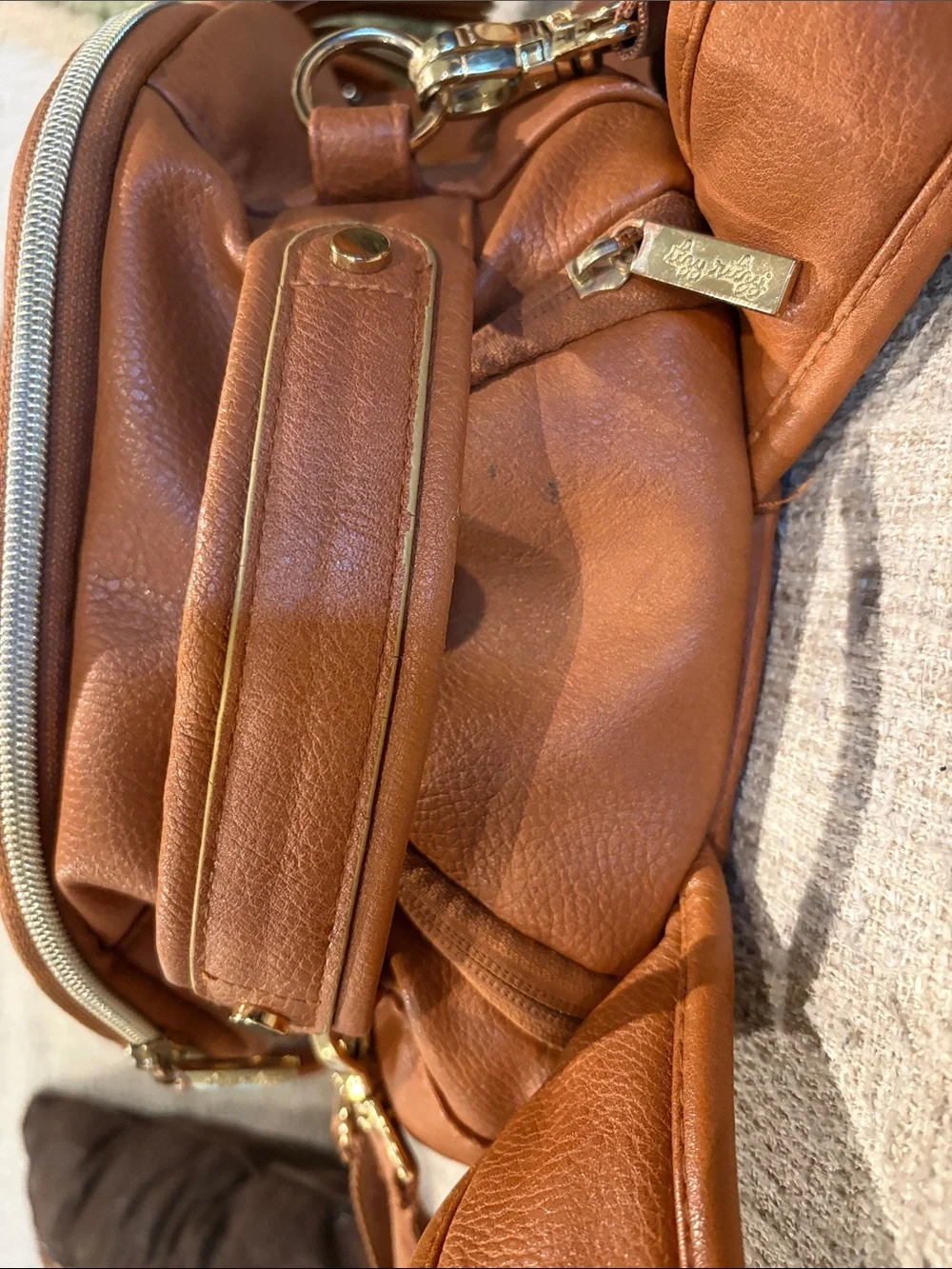 Itzy Ritzy boss baby diaper bag, cognac